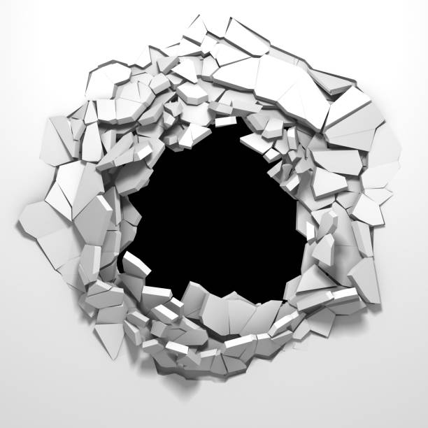 istock Dark destruction cracked hole in white stone wall 1135152894