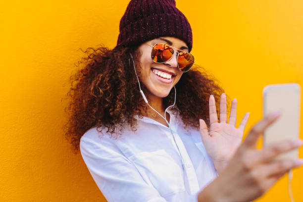 istock Urban african girl making a video call 1135153003