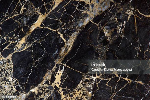 Black Marble With Beautiful Yellow Streaks Called New Portoro Stock Photo - Download Image Now