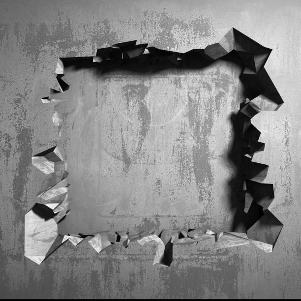 istock Dark cracked broken hole in concrete wall 1135153842
