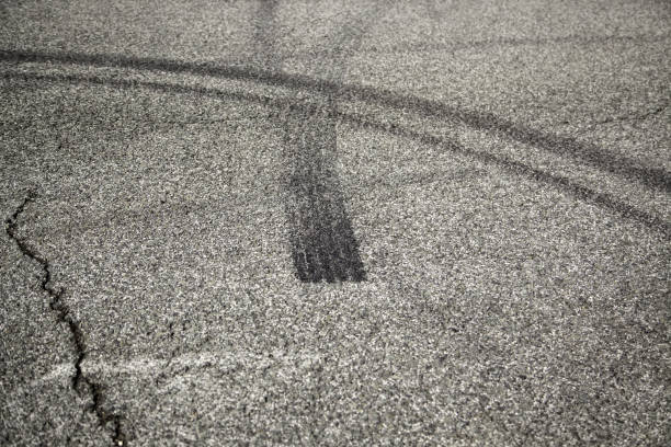 Road drifting texture Texture road drift, vehicles and driving, traffic street skid marks stock pictures, royalty-free photos & images