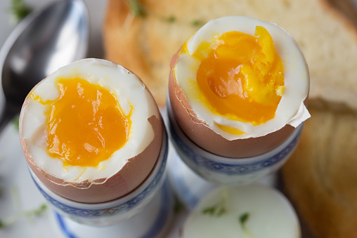 soft-boiled eggs on plate macro