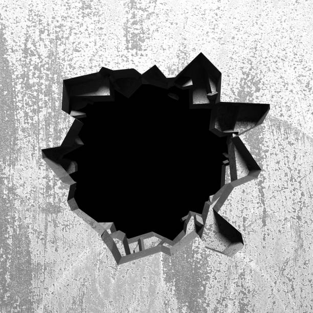 istock Dark cracked broken hole in concrete wall 1135154153