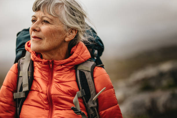 istock Senior woman on a hiking trip 1135154329