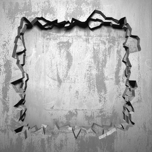 istock Dark cracked broken hole in concrete wall 1135156681