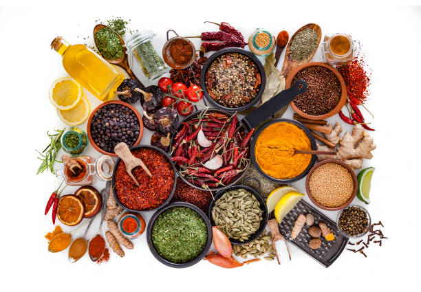 istock Spices and herbs shot from above on white background 1135157576