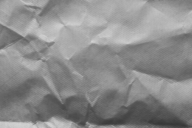 istock grey creased wrapping paper background texture 1135157660