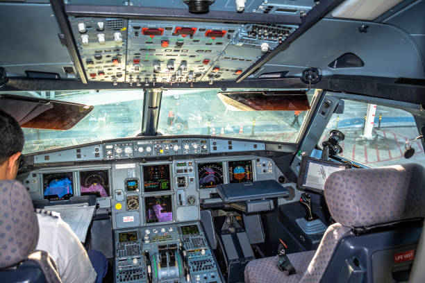 Aviation: Cockpit Airbus A320 - PR-MZH - LATAM Airlines - Cuiaba Airport (CGB / SBCY), Brazil Cuiaba, MT, Brazil - December 24, 2018 -   AVIATION: Cockpit of the Airbus A320 registration PR-MZH operated by LATAM Airlines. Photographed at the Cuiaba International Airport (IATA Code: CGB / ICAO Code: SBCY), in the state of Mato Grosso, MT, Central-West region of the country Brazil.

LATAM Airlines is currently a merger of TAM and LAN Chile, founded in 2016 this merger. Currently LATAM still flies with some aircraft in the extinct TAM colors. Gradually the planes in the fleet gradually gained the new colors of the new airline. cuiabá photos stock pictures, royalty-free photos & images