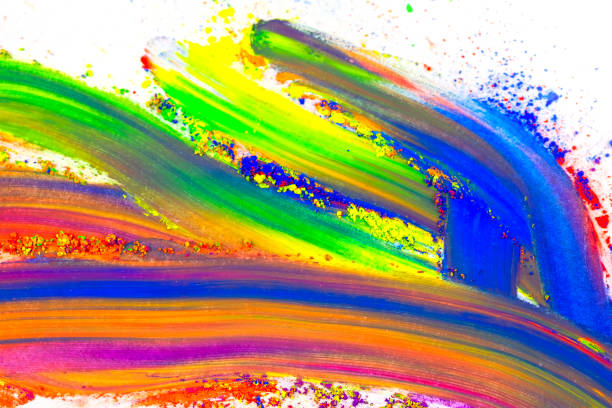 Natural colored pigment powder smeared on a sheet of white paper. Cosmetics product isolated on white background.
