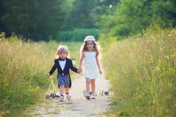 Little bride and groom Cute little bride and groom tail coat photos stock pictures, royalty-free photos & images