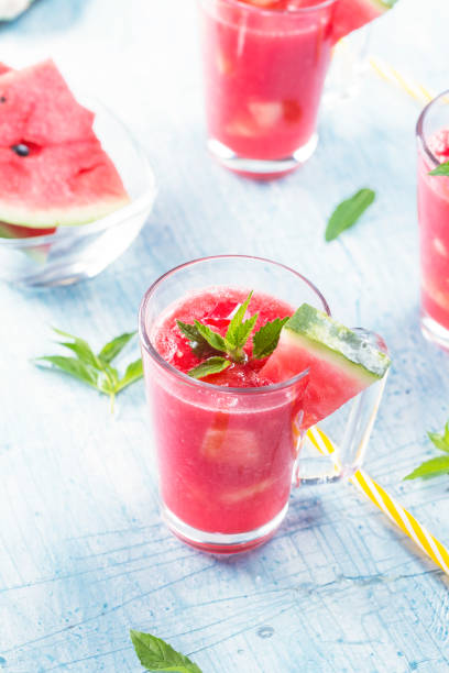 istock Summer drinks from watermelon with mint leaves over a blue table 1135162015