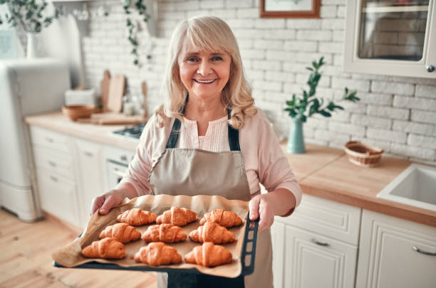 istock Senior woman on kitchen 1135163013