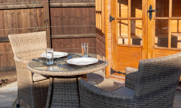 istock Table set for outdoor dining on a patio in the sunshine 1135163253