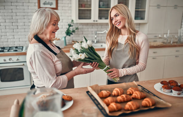 istock Mother with daughter at home 1135165100