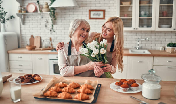 istock Mother with daughter at home 1135165185