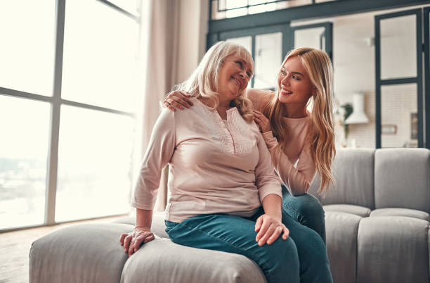 istock Mother with daughter at home 1135165310