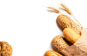 Fresh bread with seeds isolated on white background