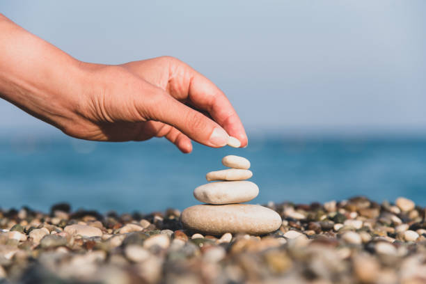 istock Harmony concept background. Meditation zen scene, relax pyramid 1135166815