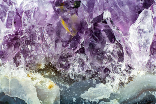 istock Abstract background texture of natural crystal amethyst 1135168498