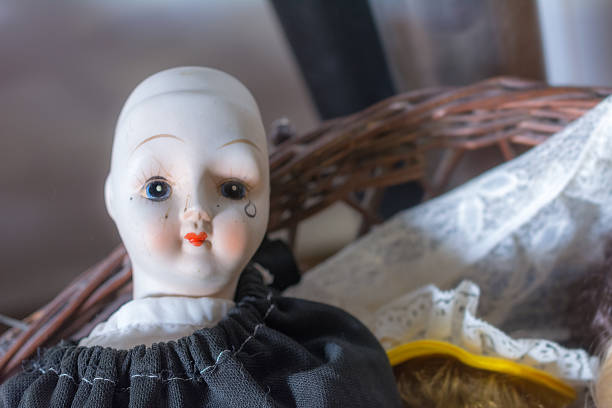 completely bald lonely doll with tear and heart shaped mouth on yard sale - completely bald imagens e fotografias de stock