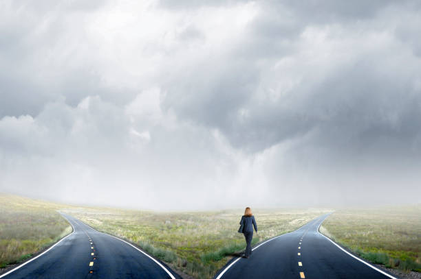 istock Businesswoman Makes A Decision At A Fork In The Road 1135173420