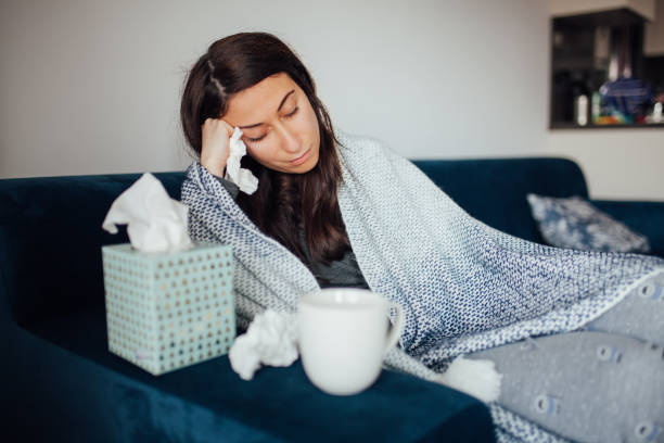 istock Sick woman resting at home 1135175055