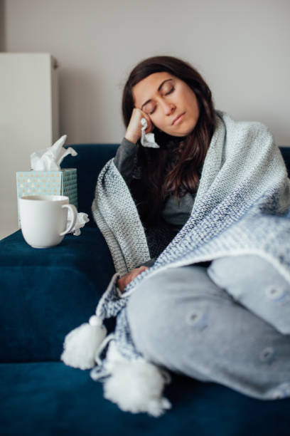 istock Sick woman resting at home 1135175333