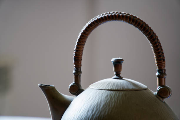 istock Old antique brass teapot on table, close-up image 1135176941
