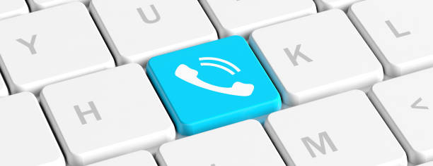 istock Call us concept. Blue key button with a phone on a computer keyboard, banner. 3d illustration 1135177364