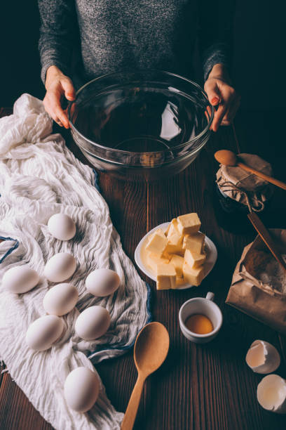 istock Young woman cooking pie 1135179624