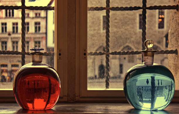 Reflection of Town Hall Square in pharmacy bottles,  Tallinn, Estonia.