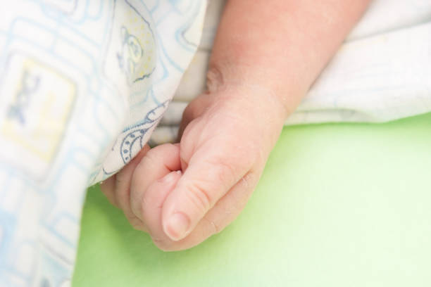 istock the newborn's palm 1135183211