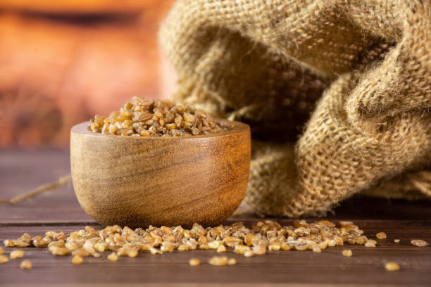 istock Raw bulgur grains with cart 1135183273