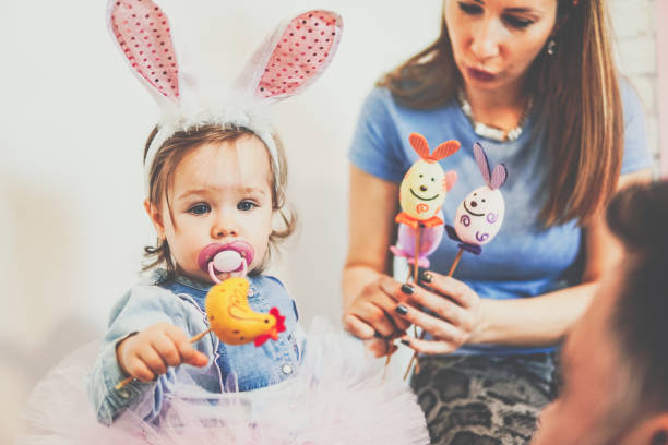 istock Little baby with Easter decoration 1135192154