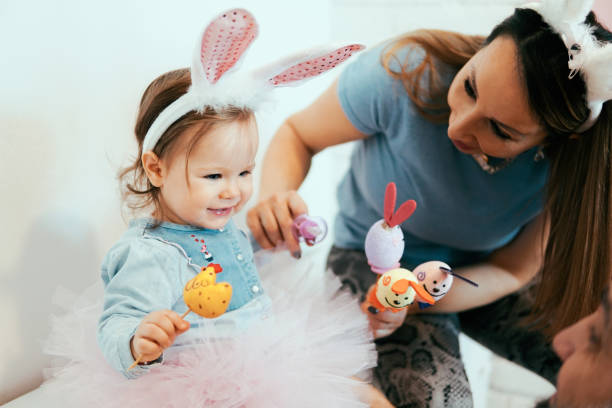 istock Little baby with Easter decoration 1135192169