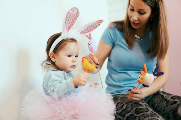 istock Little baby with Easter decoration 1135192732