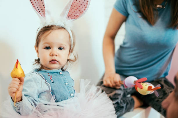 istock Little baby with Easter decoration 1135192739