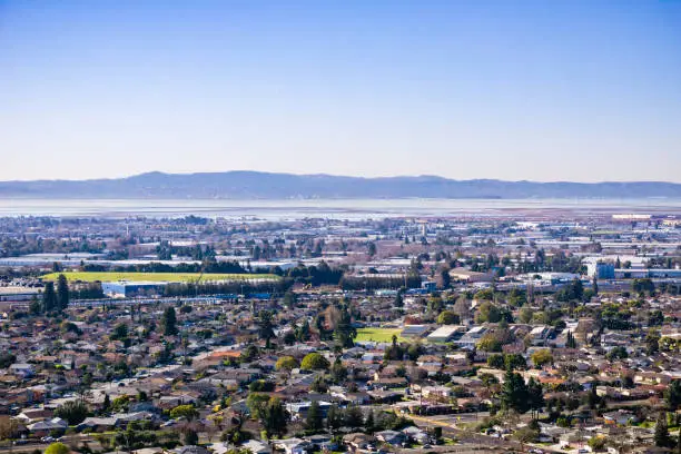 Photo of View towards the towns of east bay; San Mateo bridge on the background, San Francisco bay area, Hayward, California