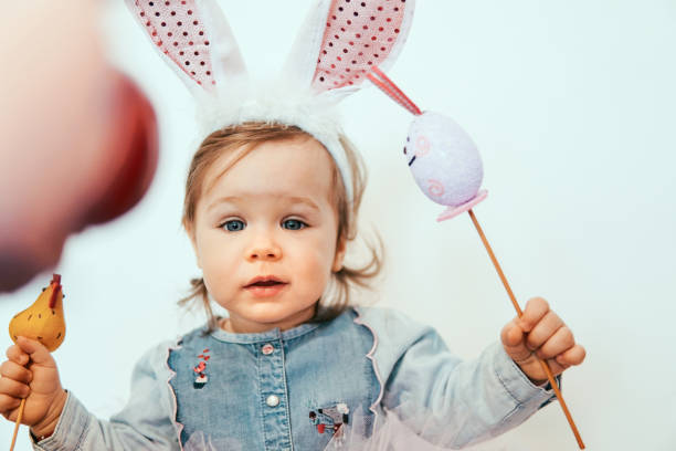 istock Little baby with Easter decoration 1135192792