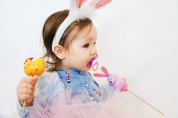 istock Little baby with Easter decoration 1135192856
