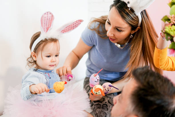 istock Little baby with Easter decoration 1135192877