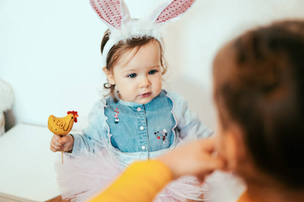 istock Little baby with Easter decoration 1135192889