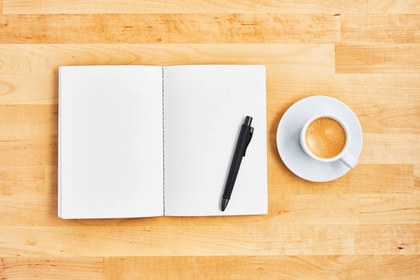 istock Office desk with blank notebook, pen and cup of coffee 1135193182