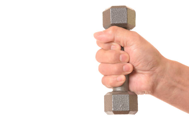 istock Dumbbell and senior hand 1135194020