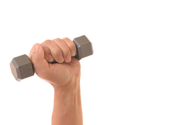 istock Dumbbell and senior hand 1135194043
