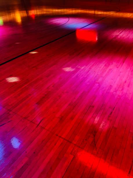 Roller Rink Red Disco ball lights on wood floor roller rink stock pictures, royalty-free photos & images