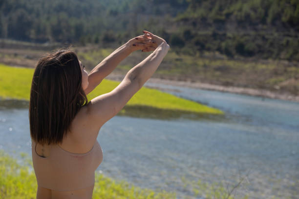istock Fitness in nature, outdoor yoga practicing 1135196054