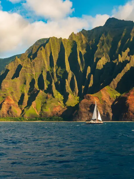Scenes from the coast of Kauai from a sailboat in the Pacific.