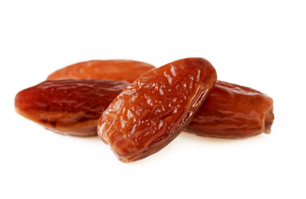 istock Closeup Of Dates Fruit Pile Heap Date On White 1135201589