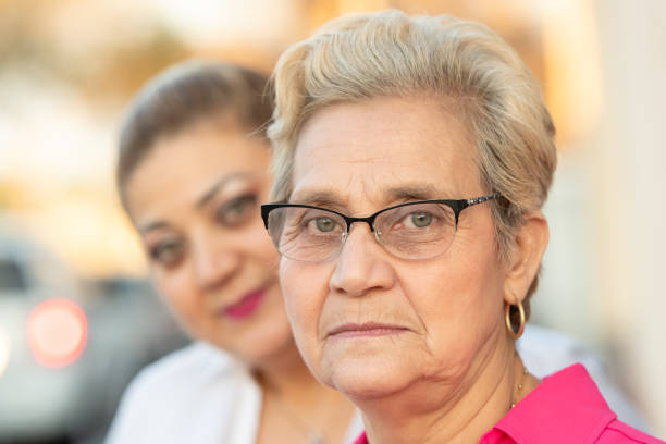 istock Senior woman posing with her mature daughter 1135202638